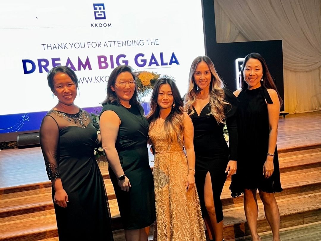 KKOOM representatives attending the Dream Big Gala on stage.