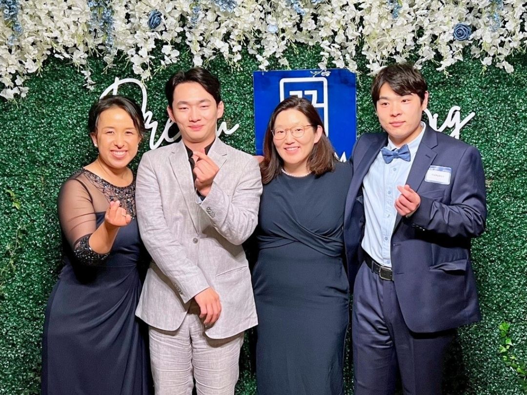 KKOOM staff and co-founder celebrating together with two KKOOM Scholars at the KKOOM Dream Big Gala.